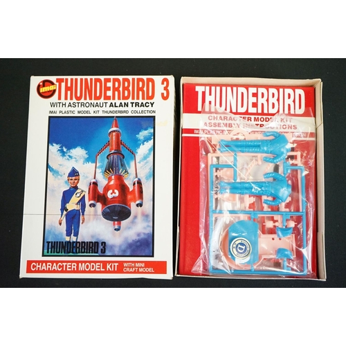 1144 - Collection of Thunderbirds diecast, model kits & figures to include 2 x boxed plastic model kits (Im... 