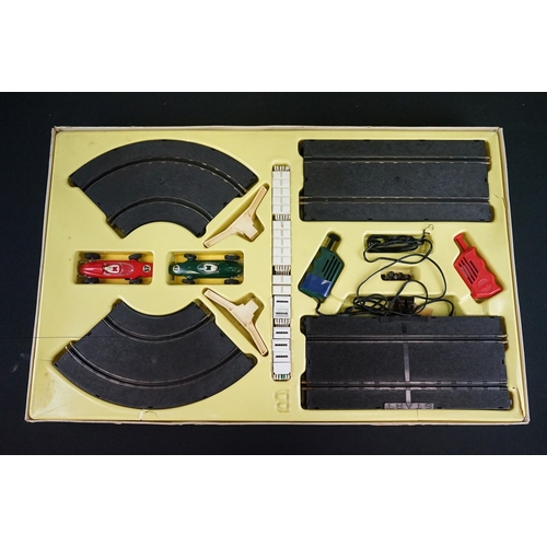 1152 - Boxed Playcraft Champion Motor Racing slot car set appearing complete with both slot cars, tatty box