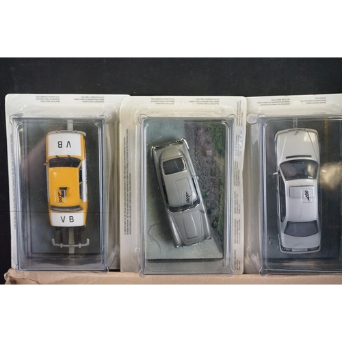 1166 - 25 Carded The James Bond Car Collection diecast models to include Maserati Biturbo 425, Jaguar XKR, ... 