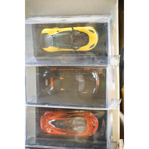 1178 - 77 Carded/cased Supercars collection diecast models by Panini with associated magazines (3 boxes)