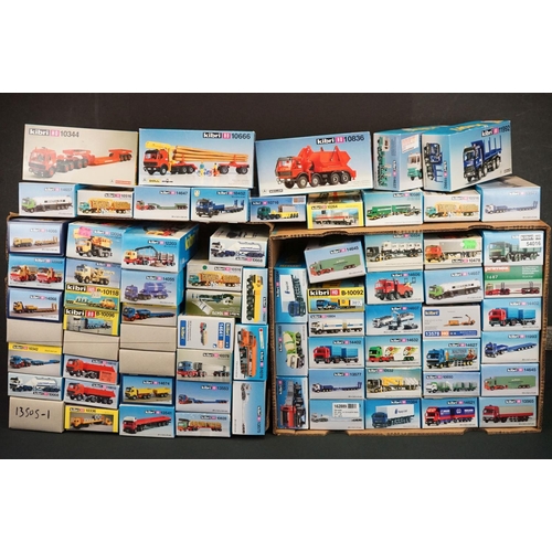 243 - Collection of around 70 boxed Kibri HO gauge plastic model kits, all various lorries & commercia veh... 