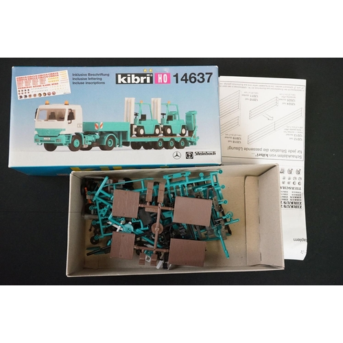 243 - Collection of around 70 boxed Kibri HO gauge plastic model kits, all various lorries & commercia veh... 