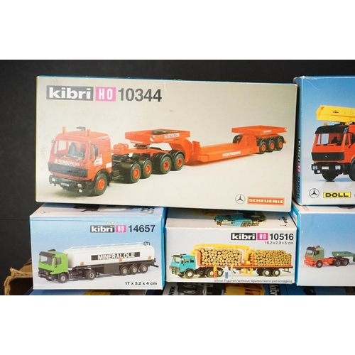 243 - Collection of around 70 boxed Kibri HO gauge plastic model kits, all various lorries & commercia veh... 