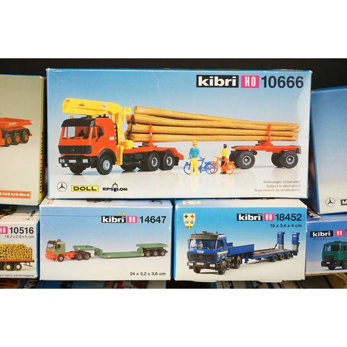 243 - Collection of around 70 boxed Kibri HO gauge plastic model kits, all various lorries & commercia veh... 