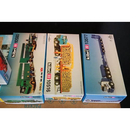 243 - Collection of around 70 boxed Kibri HO gauge plastic model kits, all various lorries & commercia veh... 