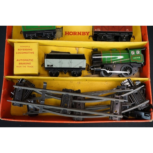 250 - Boxed Hornby O gauge Goods Set No 30 with locomotive & tender in green, 2 x items of rolling stock a... 