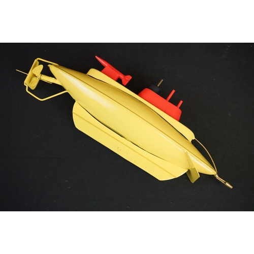 331 - Boxed Sutcliffe Model The Sea Wolf Atomic Submarine tinplate clockwork model in yellow, with key, a ... 