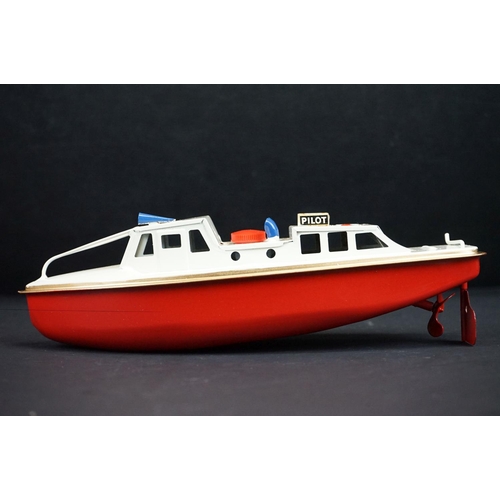 333 - Boxed Sutcliffe Model Clockwork Jupiter Ocean Pilot Cruiser tinplate model in red & white, complete ... 