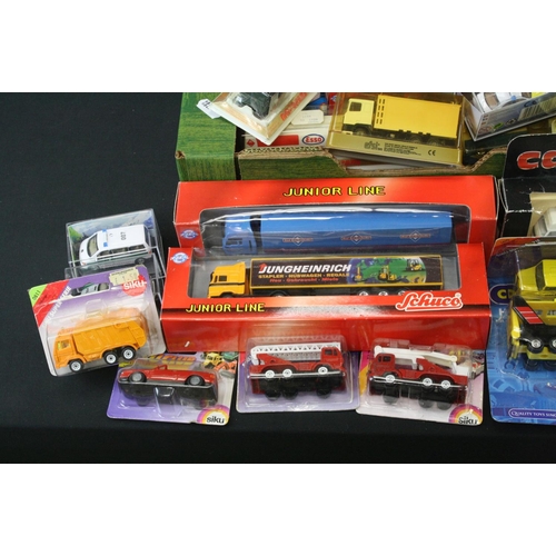 1283 - Around 80 boxed/carded diecast models & multi sets to include Siku, Matchbox Convoy, Chad Valley, Sc... 