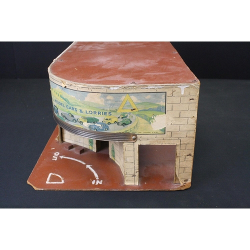 1292 - Boxed Mettoy tin plate Shell Filling Station 6275, some discolouring and wear, plus another mid 20th... 