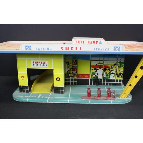 1292 - Boxed Mettoy tin plate Shell Filling Station 6275, some discolouring and wear, plus another mid 20th... 