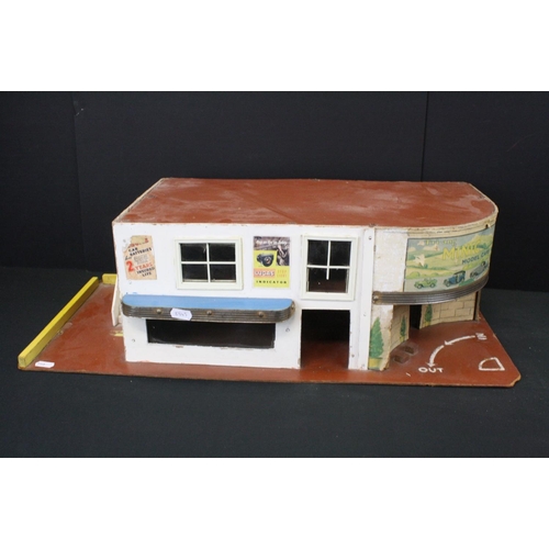 1292 - Boxed Mettoy tin plate Shell Filling Station 6275, some discolouring and wear, plus another mid 20th... 