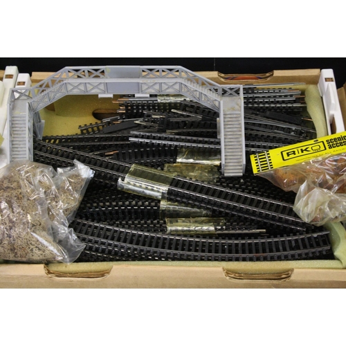 255 - Quantity of OO gauge model railway accessories to include trackside buildings, track, controller, fo... 