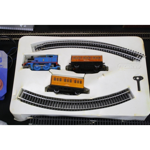 257 - Quantity of Hornby OO gauge model railway to include Thomas the Tank Engine locomotive set with Anni... 