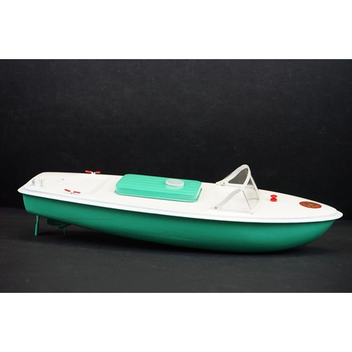 342 - Boxed Sutcliffe Model Hawk clockwork metal speed boat in light green & white, complete with flag & k... 