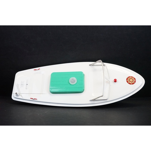 342 - Boxed Sutcliffe Model Hawk clockwork metal speed boat in light green & white, complete with flag & k... 