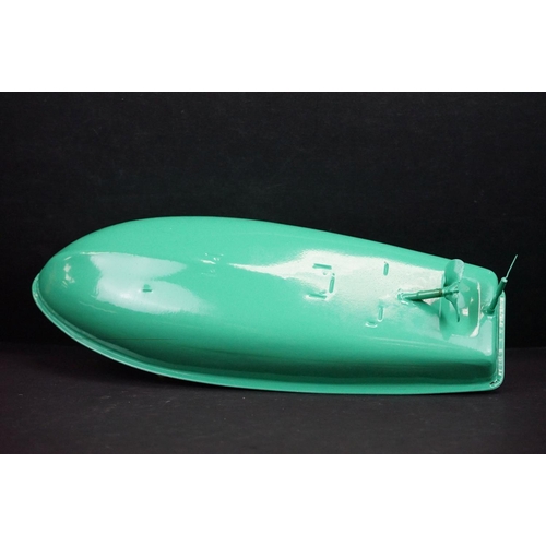 342 - Boxed Sutcliffe Model Hawk clockwork metal speed boat in light green & white, complete with flag & k... 