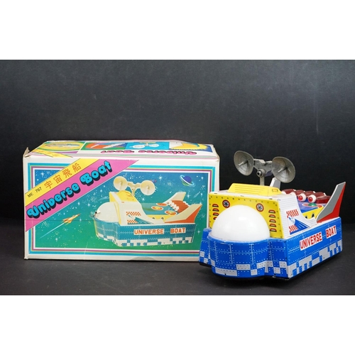 352 - Four boxed tinplate Outer Space related models, to include Astronef Electrique Space Ship, Rocket Ra... 