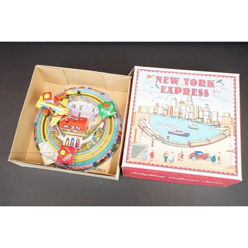 353 - Eight boxed Schylling tinplate models / toys, to include San Francisco Tours, New York Express, Wind... 