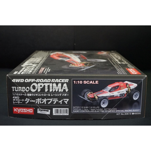 389 - Boxed Kyosho 1/10 R/C 4WD Off Road Racer Turbo Optima radio control car, with instructions