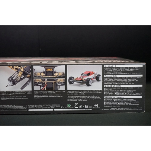 389 - Boxed Kyosho 1/10 R/C 4WD Off Road Racer Turbo Optima radio control car, with instructions