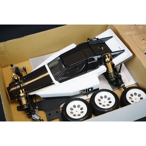 389 - Boxed Kyosho 1/10 R/C 4WD Off Road Racer Turbo Optima radio control car, with instructions