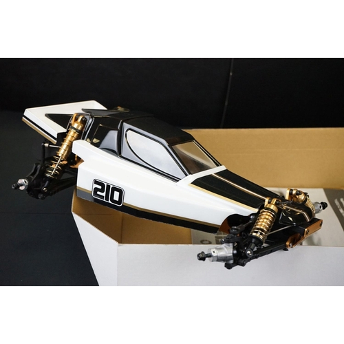 389 - Boxed Kyosho 1/10 R/C 4WD Off Road Racer Turbo Optima radio control car, with instructions