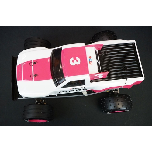 390 - Boxed Tamiya 1/10 58086 R/C Toyota Hi-Lux Monster Racer radio control car with instructions