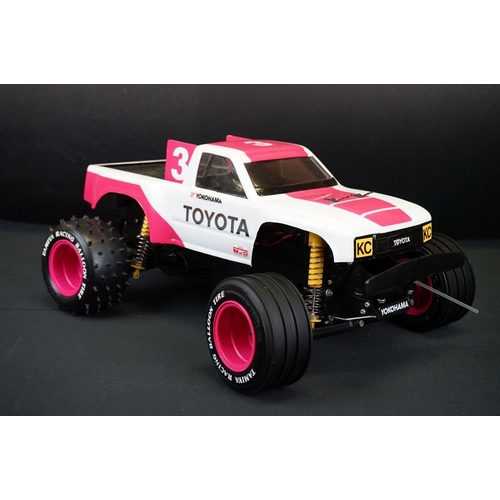 390 - Boxed Tamiya 1/10 58086 R/C Toyota Hi-Lux Monster Racer radio control car with instructions