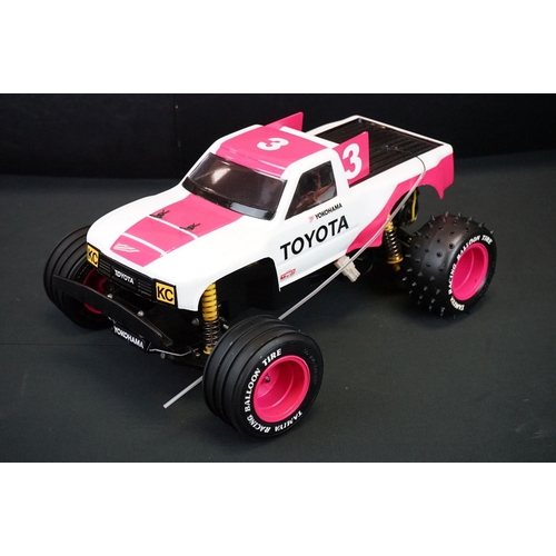 390 - Boxed Tamiya 1/10 58086 R/C Toyota Hi-Lux Monster Racer radio control car with instructions