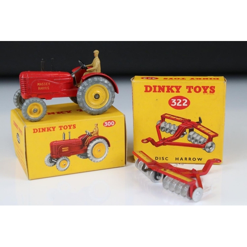 1330 - Boxed Dinky 300 Massey-Harris Tractor diecast model in red with driver, plus a boxed 322 Disc Harrow... 