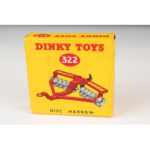 1330 - Boxed Dinky 300 Massey-Harris Tractor diecast model in red with driver, plus a boxed 322 Disc Harrow... 