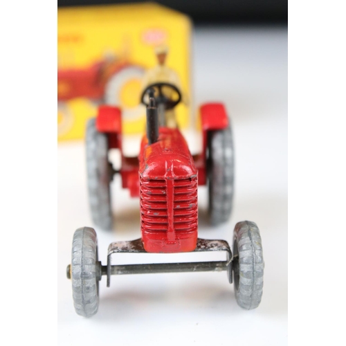 1330 - Boxed Dinky 300 Massey-Harris Tractor diecast model in red with driver, plus a boxed 322 Disc Harrow... 