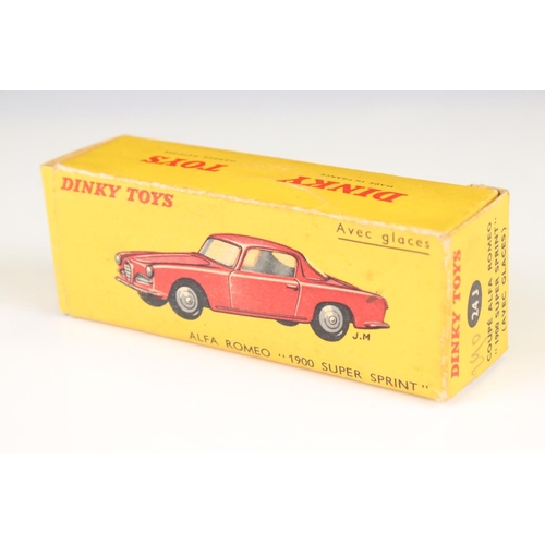 1333 - Two Boxed Dinky diecast models to include 24 M Volkswagen Karmann - Ghia (avec glaces) in red with b... 