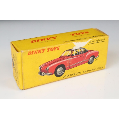 1333 - Two Boxed Dinky diecast models to include 24 M Volkswagen Karmann - Ghia (avec glaces) in red with b... 