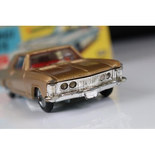 1354 - Two boxed boxed Corgi diecast models to include 245 Buick Riviera in bronze with red interior (dieca... 