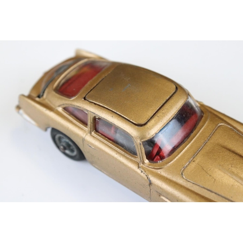 1355 - Boxed Corgi 261 James Bond 007 Aston Martin DB5 diecast model with ejector figure and secret instruc... 