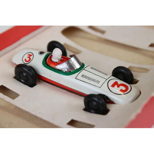 1362 - Boxed GDR made tin plate 5012 Grand Prix set of 4 x racing cars, features yellow, red, white & green... 