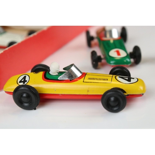 1362 - Boxed GDR made tin plate 5012 Grand Prix set of 4 x racing cars, features yellow, red, white & green... 