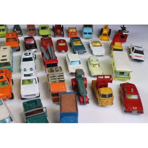 1375 - Around 40 diecast models to include Corgi Juniors, Husky and Matchbox examples, play worn