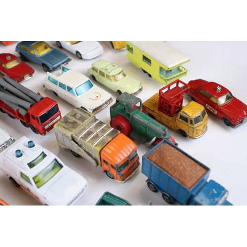 1375 - Around 40 diecast models to include Corgi Juniors, Husky and Matchbox examples, play worn