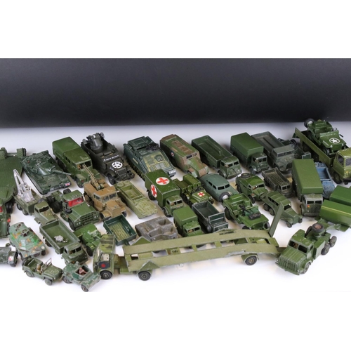 1376 - Over 35 play worn diecast military models, mostly Dinky and Corgi mid 20th C, to include Dinky Strik... 