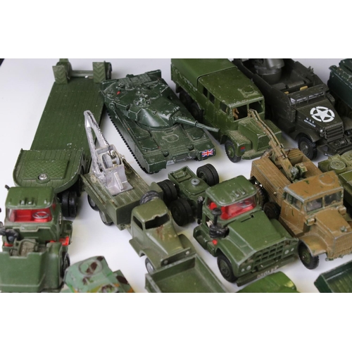 1376 - Over 35 play worn diecast military models, mostly Dinky and Corgi mid 20th C, to include Dinky Strik... 