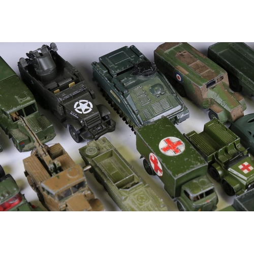 1376 - Over 35 play worn diecast military models, mostly Dinky and Corgi mid 20th C, to include Dinky Strik... 