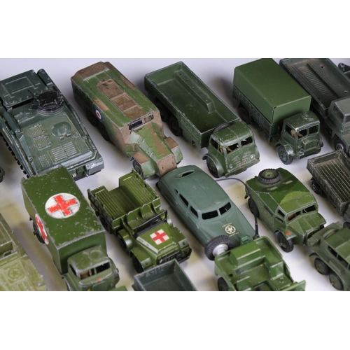 1376 - Over 35 play worn diecast military models, mostly Dinky and Corgi mid 20th C, to include Dinky Strik... 