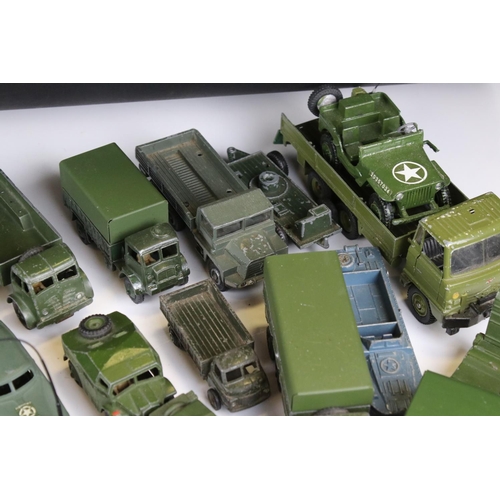 1376 - Over 35 play worn diecast military models, mostly Dinky and Corgi mid 20th C, to include Dinky Strik... 