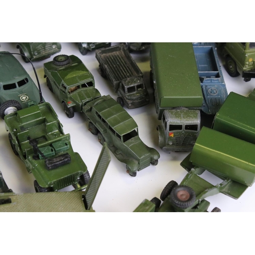 1376 - Over 35 play worn diecast military models, mostly Dinky and Corgi mid 20th C, to include Dinky Strik... 