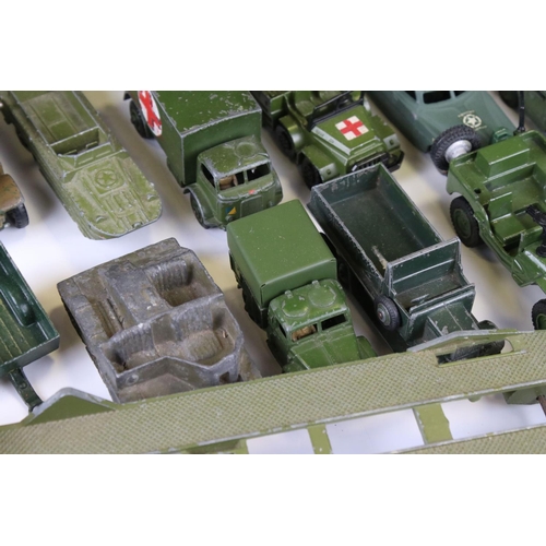 1376 - Over 35 play worn diecast military models, mostly Dinky and Corgi mid 20th C, to include Dinky Strik... 