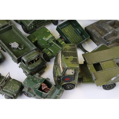 1376 - Over 35 play worn diecast military models, mostly Dinky and Corgi mid 20th C, to include Dinky Strik... 