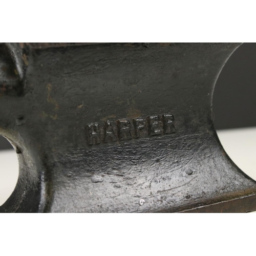 12 - Cast Iron Miniature Cobbler's Anvil by Harper and number 4006 with an attached shoe last, 22cm long